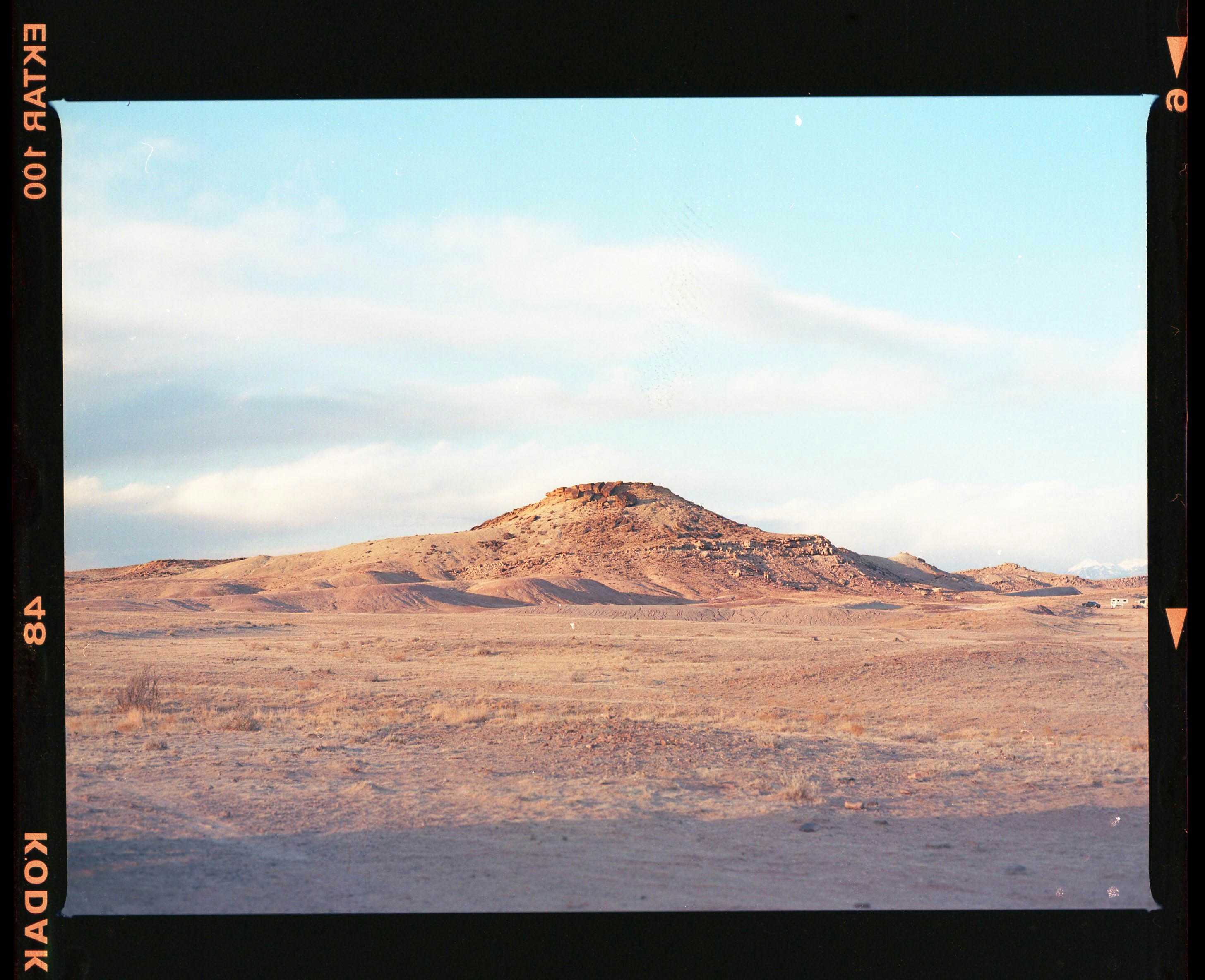 brown mountain under blue sky during daytime